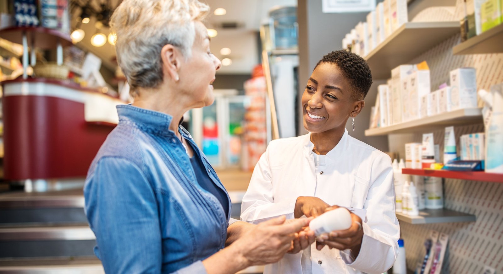 pharmacist with patient