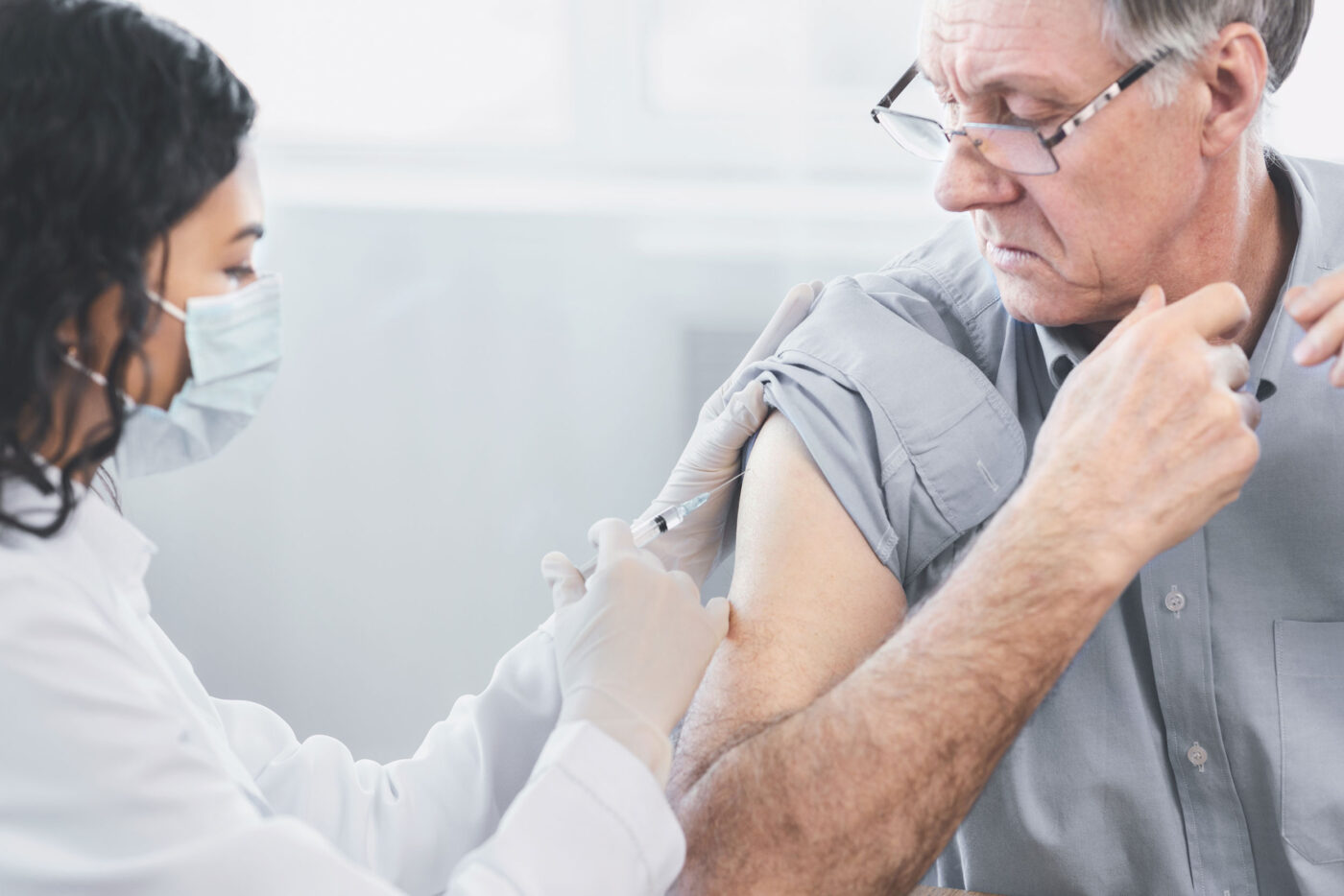 man getting vaccinated